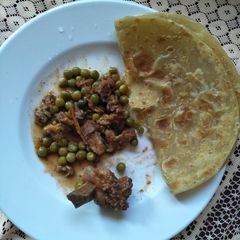 A picture of Minji beef stew with chapati.