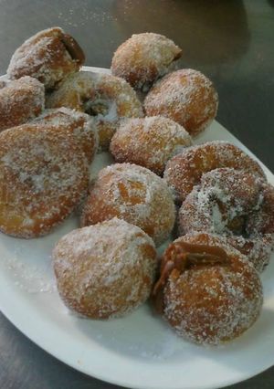 Una foto de Berlinesas rellenas con dulce de leche