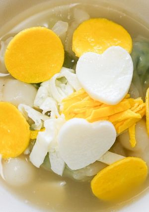 A picture of Tteokguk - Rice Cake Dumpling Soup | 10 Minutes Recipe for a Happy New Year 🌞🤍.
