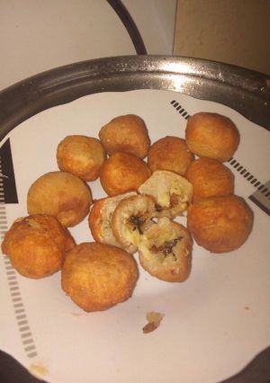 Una foto de Bolitas de queso y cebolla diferentes