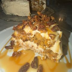 A picture of Best Ever Carrot Cake with Bourbon Buttermilk Caramel Sauce and Candied Bourbon Pecans.