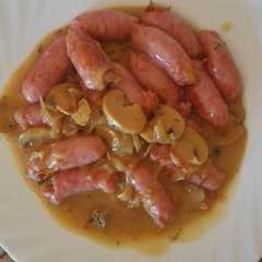 Una foto de Salchichas de pollo al vino