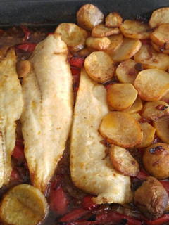 Una foto de Filetes de merluza al horno