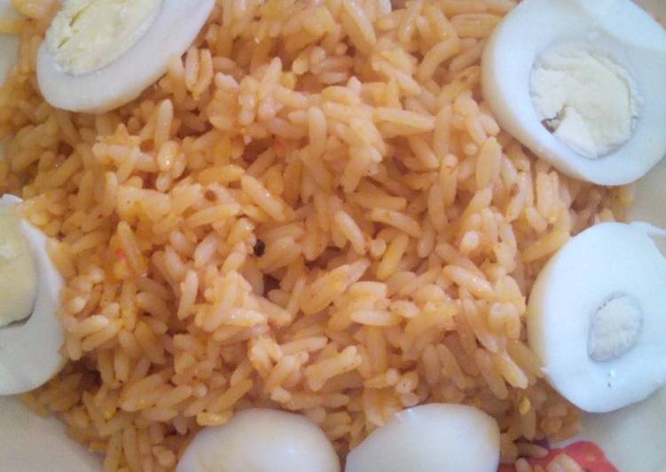 Jellof rice and boiled eggs