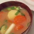 Vegan Miso soup with carrot, potato and spring onion