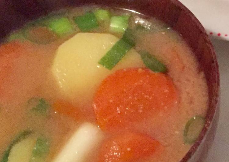 Vegan Miso soup with carrot, potato and spring onion