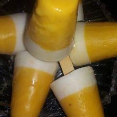 A picture of Mango curd popsicles.