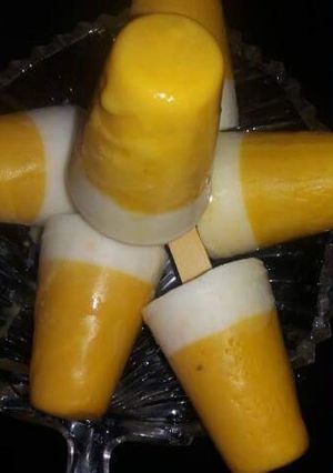 A picture of Mango curd popsicles.