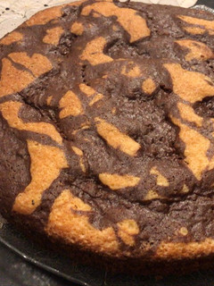 Una foto de Torta marmolada limón y chocolate