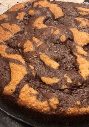 Una foto de Torta marmolada limón y chocolate