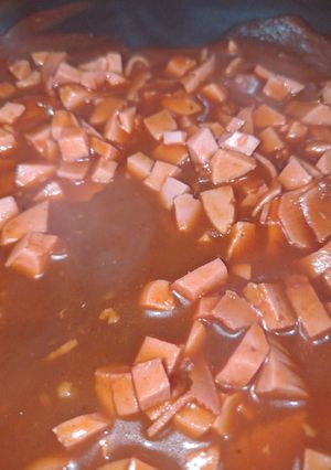 Una foto de Salchichón en salsa