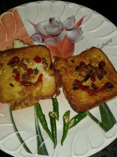 A picture of Egg and bread toast (dim paurooti).