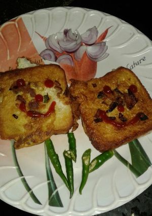 A picture of Egg and bread toast (dim paurooti).