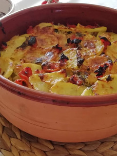 Foto di Patate, riso e cozze nel coccio