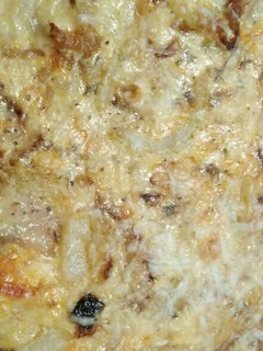 Una foto de Pizza carbonara