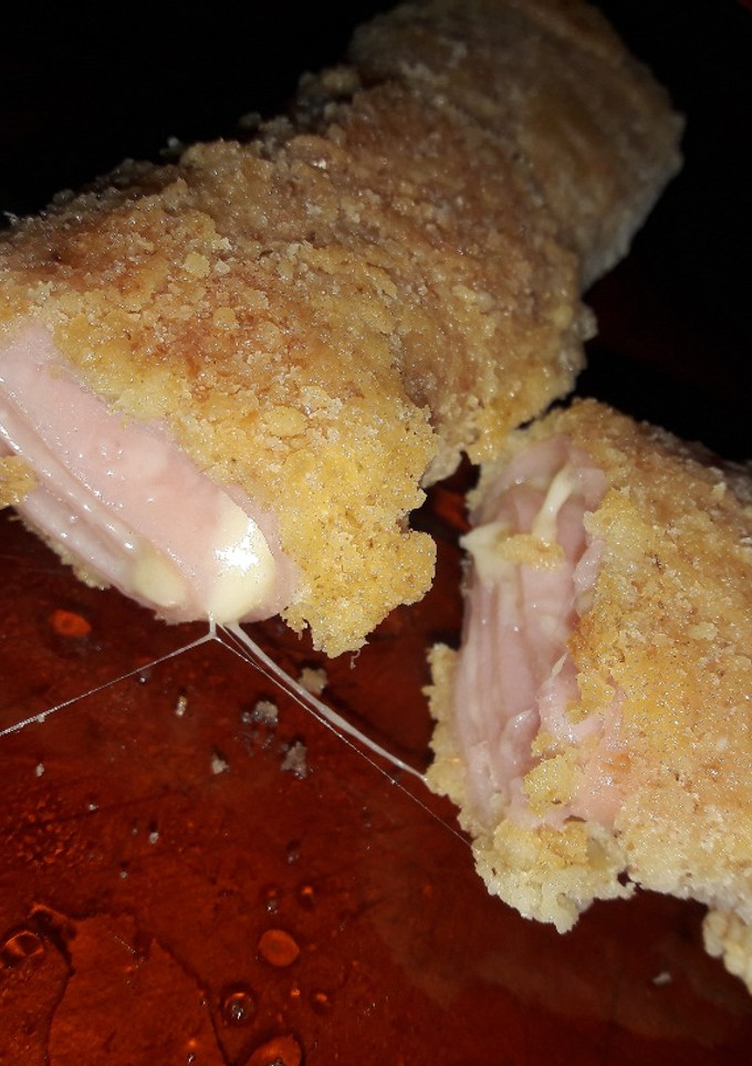 Una foto de Rollitos de paleta y queso