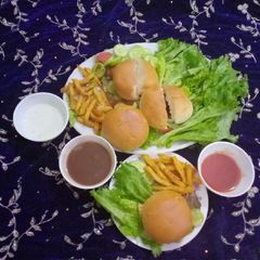 MINI CHAPLI BURGER 👑 WITH FRENCH FRIES A picture of MINI CHAPLI BURGER 👑 WITH FRENCH FRIES.