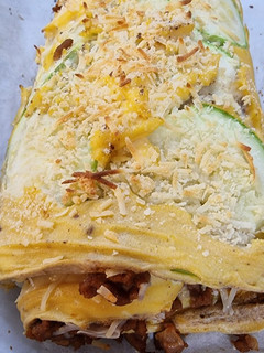 Una foto de Rollo de calabacín y huevo