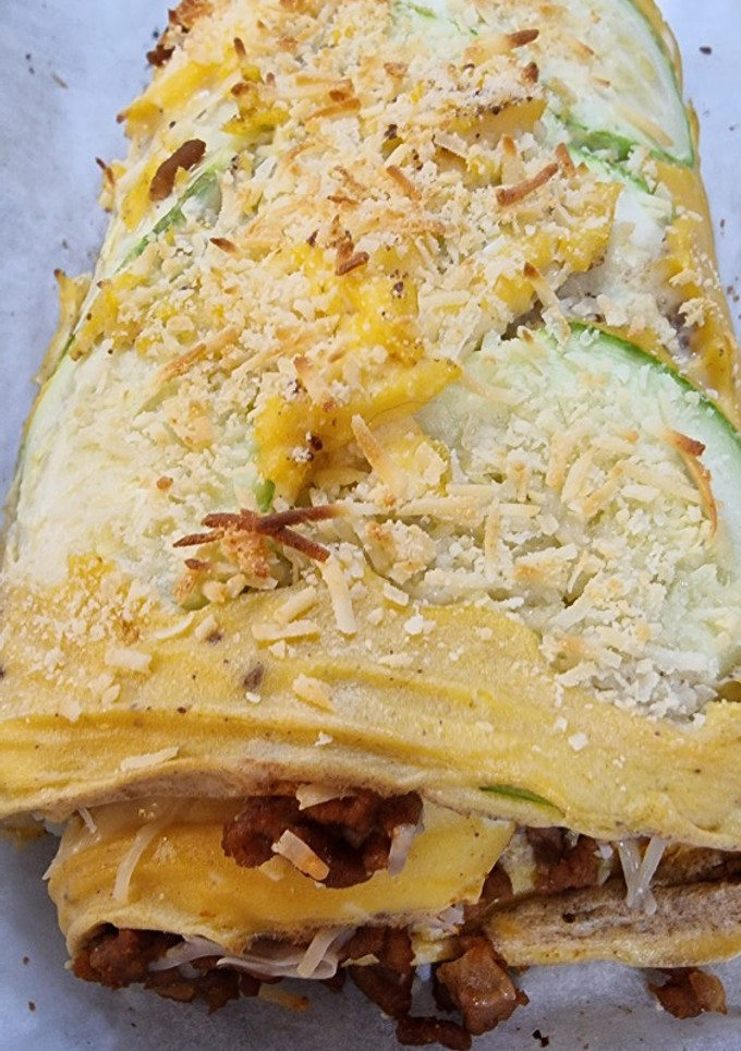 Una foto de Rollo de calabacín y huevo