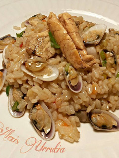 Una foto de Arroz con coquinas y huevas de jurelillos blancos