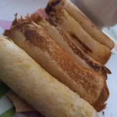A picture of Ham and bread roll ups.