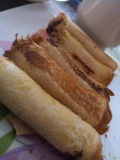 A picture of Ham and bread roll ups.