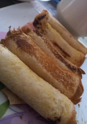 A picture of Ham and bread roll ups.