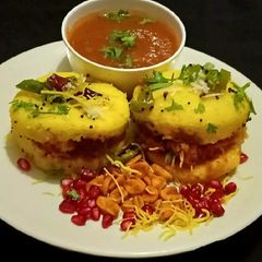 A picture of Khaman Dhokla Dabeli - festive appetizer or Snack platter.