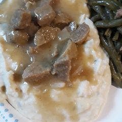 Mashed Potatoes and Meatball Sauce A picture of Mashed Potatoes and Meatball Sauce.