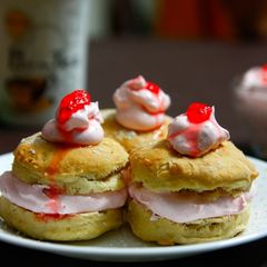 A picture of Vanilla Scones with Strawberry Cream Filling.