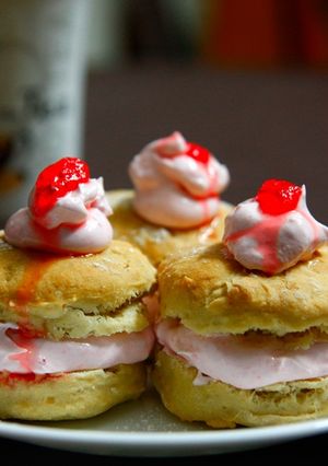 A picture of Vanilla Scones with Strawberry Cream Filling.