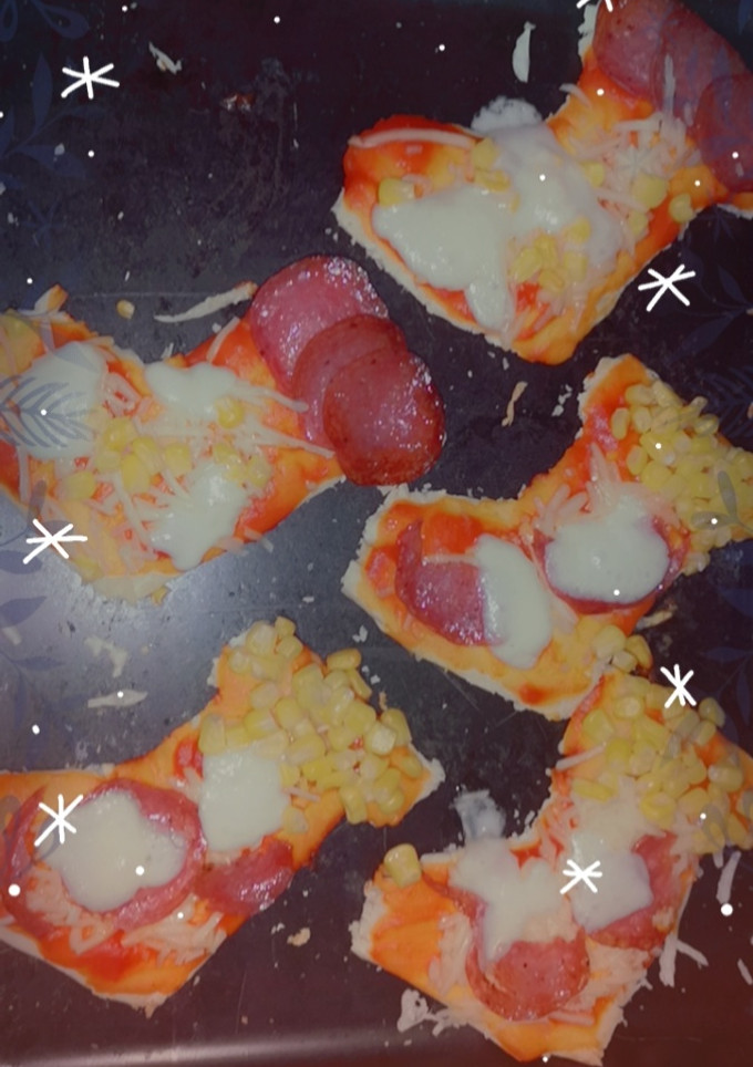 Una foto de ☃️Mini pizza calcetín de Navidad ☃️