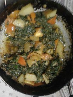 A picture of Spinach aloo veg.
