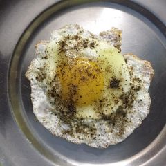 A picture of Half boiled egg sunnyface.
