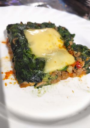 Una foto de Pastel de calabaza, soja y espinaca