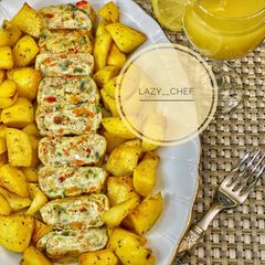 A picture of Grilled potatoes and rolled omelette.