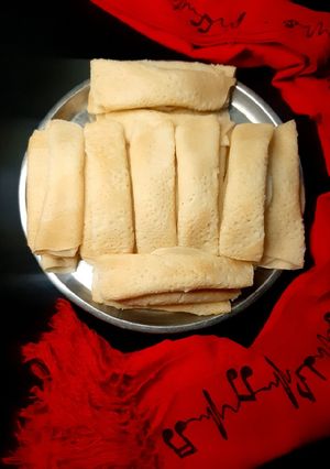 চিনি - নারকেল পাটিসাপটা রেসিপির প্রধান ছবি