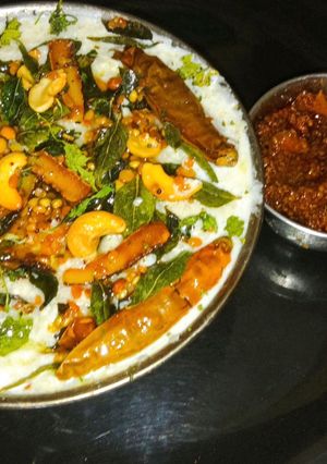 A picture of Ancient probiotic South Indian style curd rice with mango pickle.