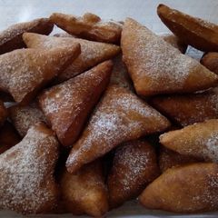 A picture of Mandazi with cardamom powder.