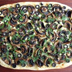 A picture of Mushroom & Black Olive Flammkuchen.