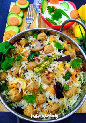 A picture of Soya Chunks- Mushroom-Peas Pulao.