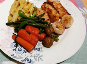 A picture of Fish stakes,grilled vegetables & mango milkshake.