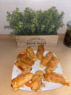 Una foto de Rollitos de Hojaldre rellenos de salchichas