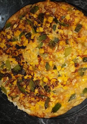Una foto de Tortilla de zapallito y choclo
