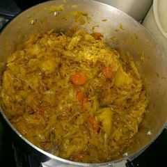 A picture of Fried cabbage and carrots.
