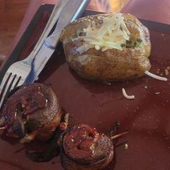 A picture of Bacon wrapped venison.