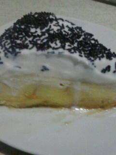 Una foto de Tarta de magdalenas con flan y nata