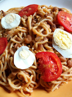 A picture of Jollof Spaghetti and Beans.