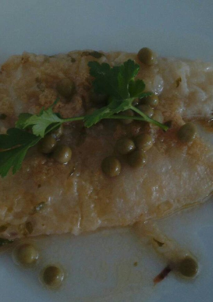 Una foto de Merluza en salsa verde