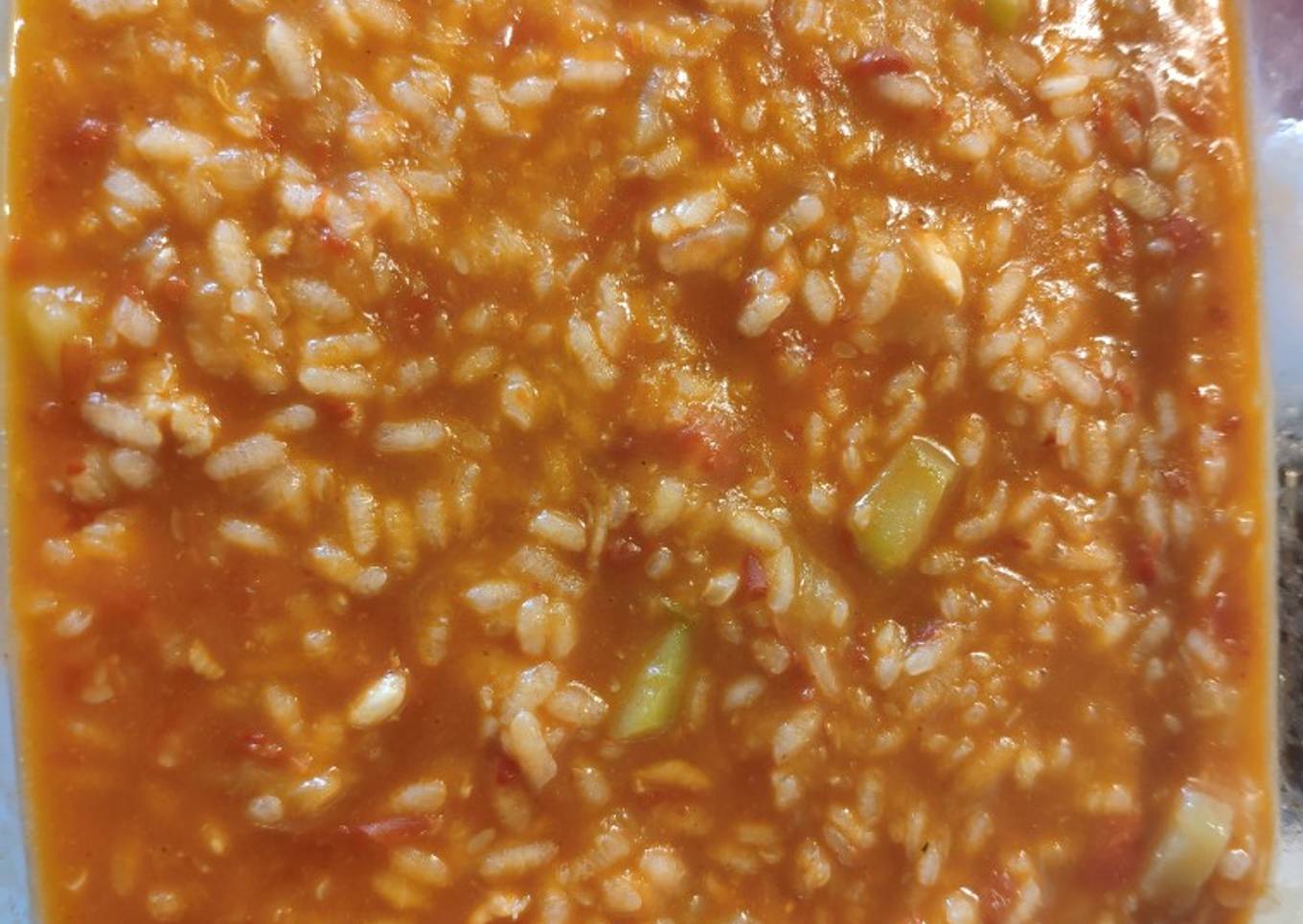 Arroz caldoso de calabacín y gambones en mambo